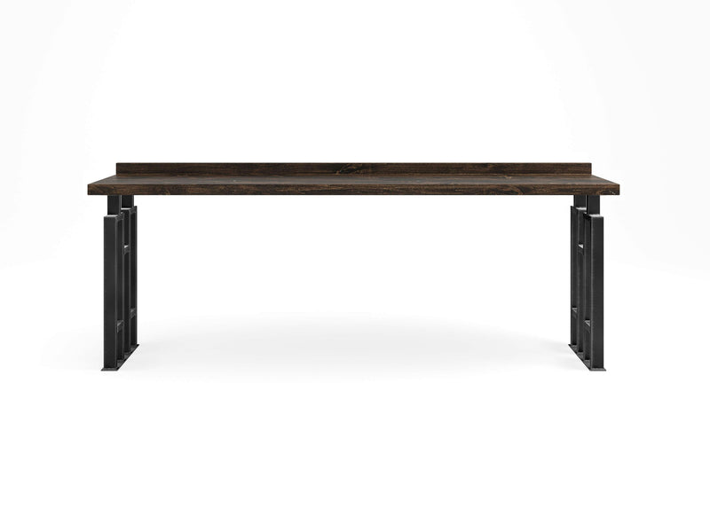 Introducing the Clark Sofa Table - Tobacco by James+James: A modern table with a sleek dark wooden top and sturdy black metal legs. This table boasts an industrial design with a minimalist aesthetic, featuring side supports that provide ample open space underneath. Set against a plain white background, it’s perfect for any contemporary interior.