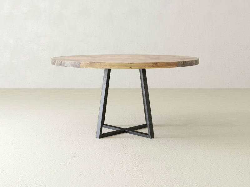 A close-up of the Watson Round Dining Table - Harvest Wheat by James+James.