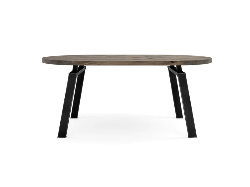 Introducing the Fulton Oval Dining Table by James+James, crafted from barn wood with a sleek and simple design. This table boasts a smooth oval tabletop and four black metal legs that slightly widen at the base, designed for sturdy support and offering a modern, minimalist aesthetic.