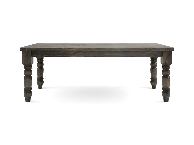 A James+James Baluster Dining Table in Deep Grey, featuring a smooth top and four intricately carved legs, is centered against a white background. The table's design is simple yet elegant, suitable for dining or as a decorative piece.