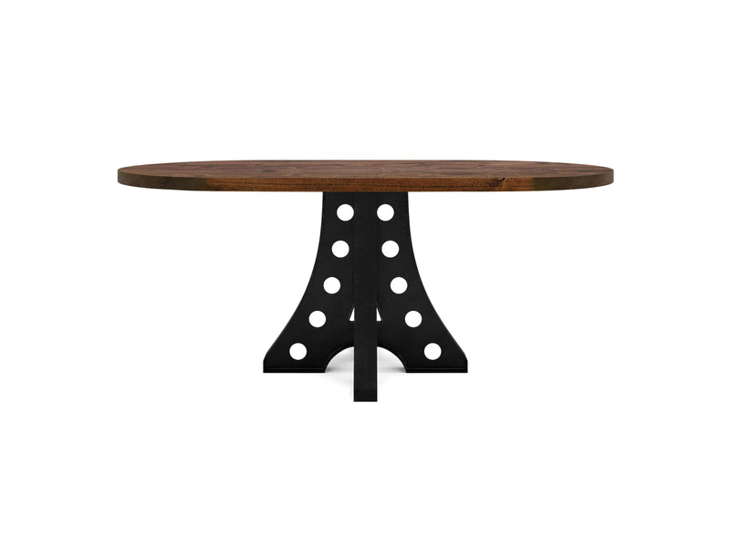 Introducing the Amelia Oval Dining Table - Tuscany by James+James: This elegant dining table features a thick, polished brown wooden top and is supported by a unique black metal base with modern design accents. The base showcases multiple circular cutouts arranged symmetrically, giving the table a contemporary and industrial aesthetic.