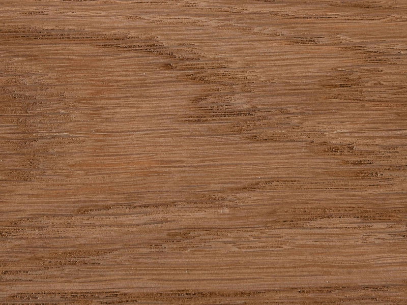 Close-up of the Barnwood on White Oak Sample from James+James, showcasing the natural grain patterns and textures. The wood features varying shades of brown with both lighter and darker streaks, offering an organic and natural appearance. The image captures detailed lines and knots in the wood.