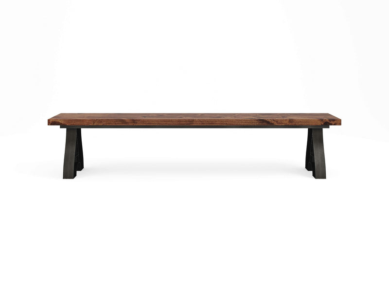 A James+James Wishbone Bench - Tuscany, featuring a minimalist rectangular dark brown wooden seat and angled black legs, is centered against a plain white background. The simple and elegant design highlights the natural grain of the wood.