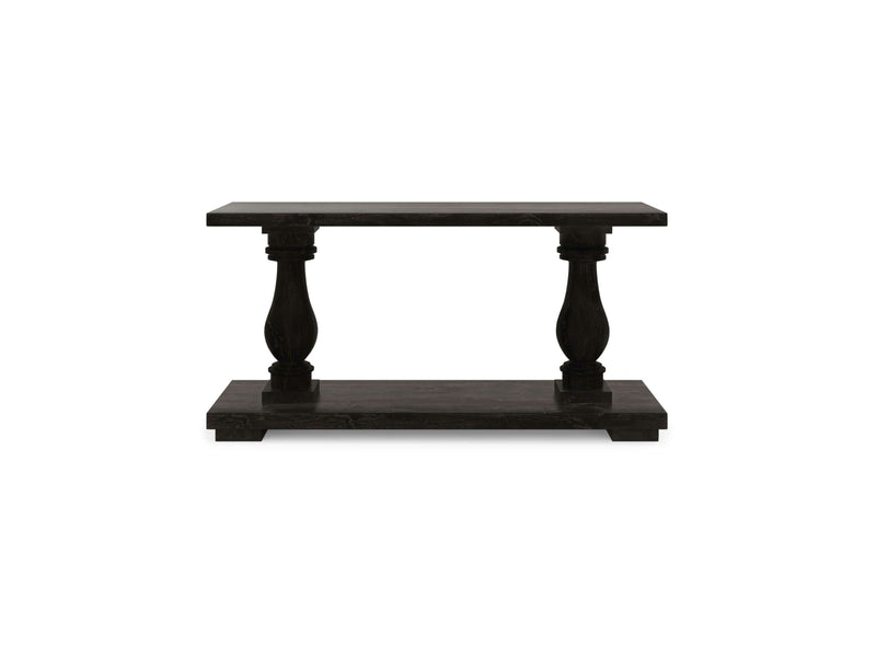 The Vivien Sofa Table - Charred Ember by James+James is a traditionally designed, dark wooden console table featuring a rectangular top and lower shelf. It boasts two intricately carved legs with a thick base and has a polished finish.