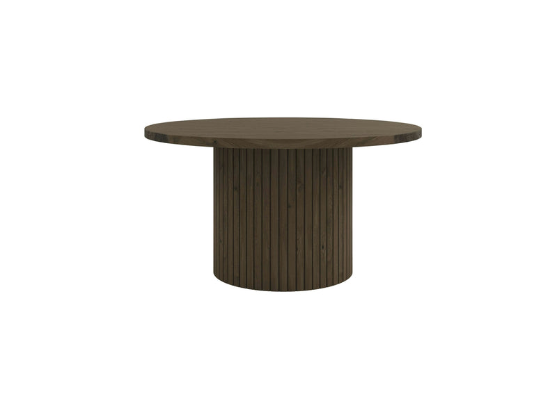 Introducing the Arthur Dining Table - Charred Ember by James+James. This round wooden table features a dark brown finish with a smooth, flat top surface and a unique cylindrical base accented with vertical slats. Its design embodies modern minimalism.