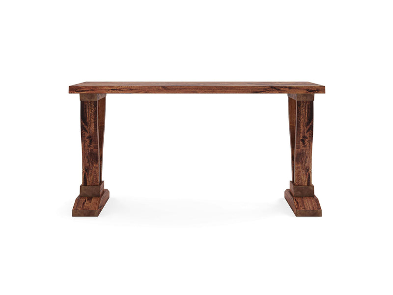 The Vera Sofa Table - Tuscany by James+James features a rectangular top made of richly finished wood with visible grain patterns that lend it a rustic charm. It is supported by thick, slightly tapered legs on each side, contributing to its wide, sturdy design.