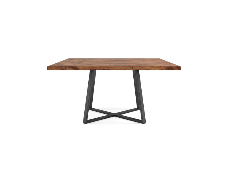 The Watson Square Dining Table - Tuscany by James+James features a thick wooden top and a sturdy black metal base with a crisscross design for support, shown against a white background.