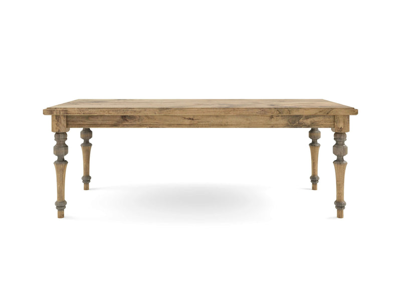 The Allyson Dining Table - Harvest Wheat by James+James is a rectangular wooden dining table with a rustic finish. The table features a thick top and four turned legs with intricate detailing. The wood has a natural, weathered appearance, giving it a vintage, farmhouse look. The background is white and uncluttered.