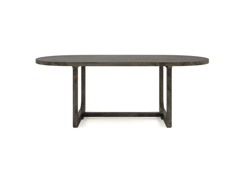 The Emersen Oval Dining Table in Deep Grey by James+James boasts a modern design with a dark wooden finish. Its thick top is supported by a geometric base comprising two rectangular side supports connected by a horizontal bar at the bottom, presenting a minimalist and sturdy look.