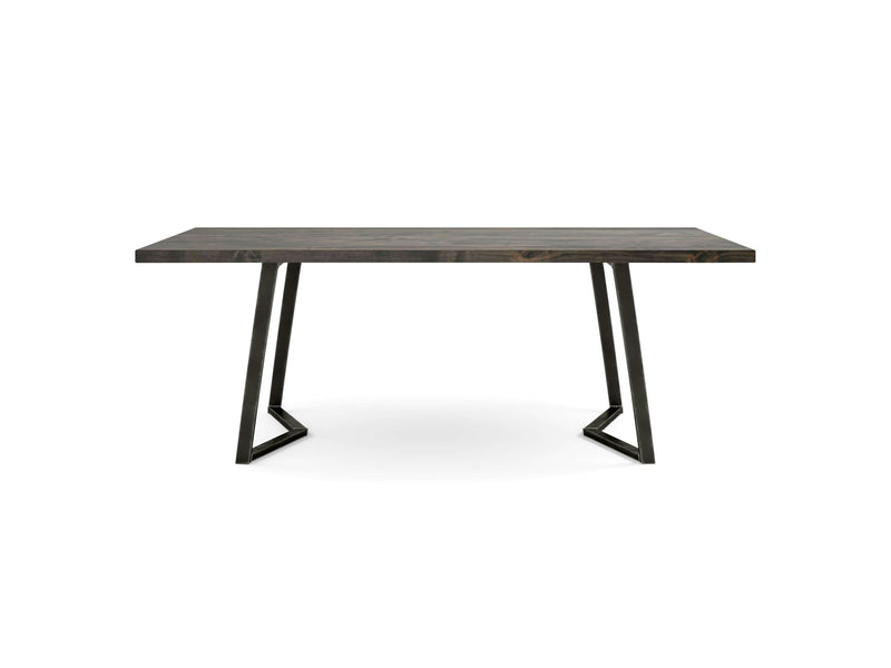 The Arkwright Dining Table - Deep Grey by James+James features a rectangular wooden top with a dark finish and angled black metal legs. Its modern and minimalist design boasts clean lines and no visible ornamentation, positioned against a plain white background.