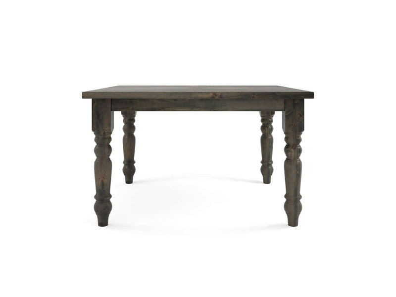 The Baluster Square Dining Table in Deep Grey by James+James features a dark finish and decorative, turned legs. It boasts a rectangular tabletop with a smooth surface and traditional, vintage-style legs that add an elegant touch. The table is displayed on a white background.