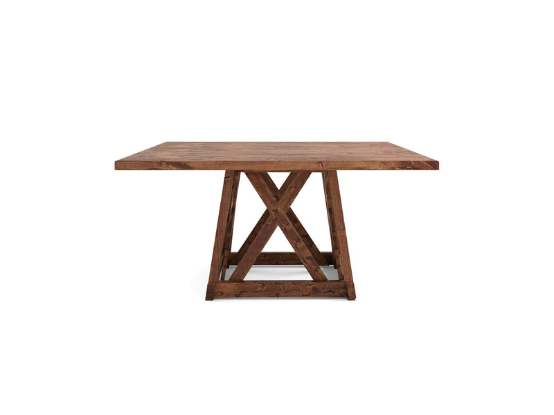 The Julia Square Dining Table - Tuscany by James+James is a sturdy piece featuring a square top and an X-shaped interlocking base. Dark-stained wood with a rustic finish highlights its robust and practical design, making it perfect for standing on any flat surface.