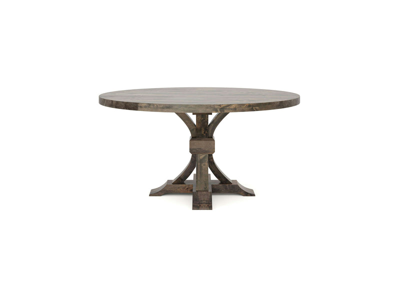 Introducing the Violet Round Dining Table - Deep Grey by James+James, a round wooden dining table featuring a rustic finish and a robust, curved pedestal base resting on four feet. The table boasts a simple and classic design that complements various decor styles. The visible wood grain enhances its rustic charm.