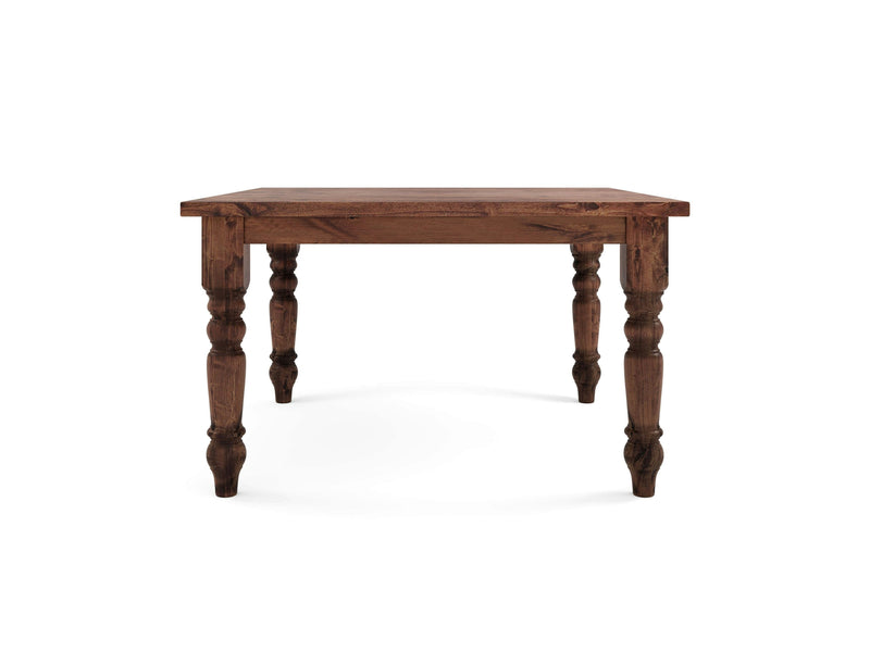 The Baluster Square Dining Table - Tuscany by James+James features a dark brown finish with intricately carved legs. This square wooden table has a simple yet classic design and is showcased alone on a white background.