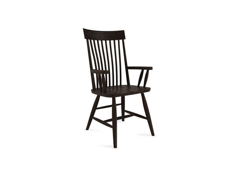 The Eleanor Arm Dining Chair - Tobacco by James+James features a slatted backrest, straight arms, and four legs joined by crossbars for added support. Its wooden construction with a dark finish offers a simple and rustic design, giving it a classic, timeless appearance.