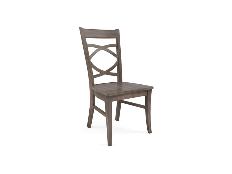 The Ansley Dining Chair - Barn Wood by James+James is a stylish wooden chair with a dark finish. It features a slightly curved backrest adorned with a crisscross design and a flat, square seat. The chair has four straight, tapered legs, and its minimalist design adds a touch of modern elegance.