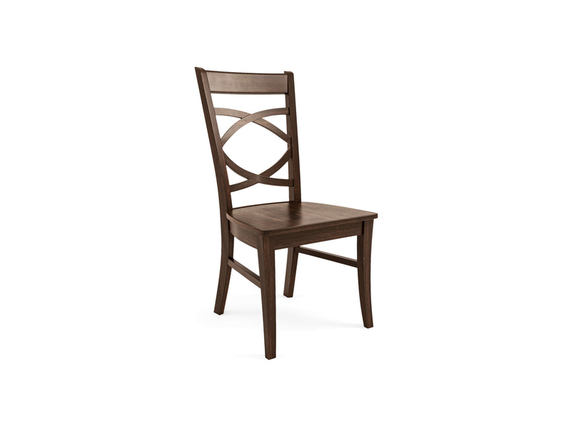 The Ansley Dining Chair - Tobacco by James+James is a dark wooden chair with a high backrest featuring a unique curved, crisscross design. It boasts a flat, rectangular seat and tapered legs, giving it a classic yet elegant appearance with a smooth and polished finish.