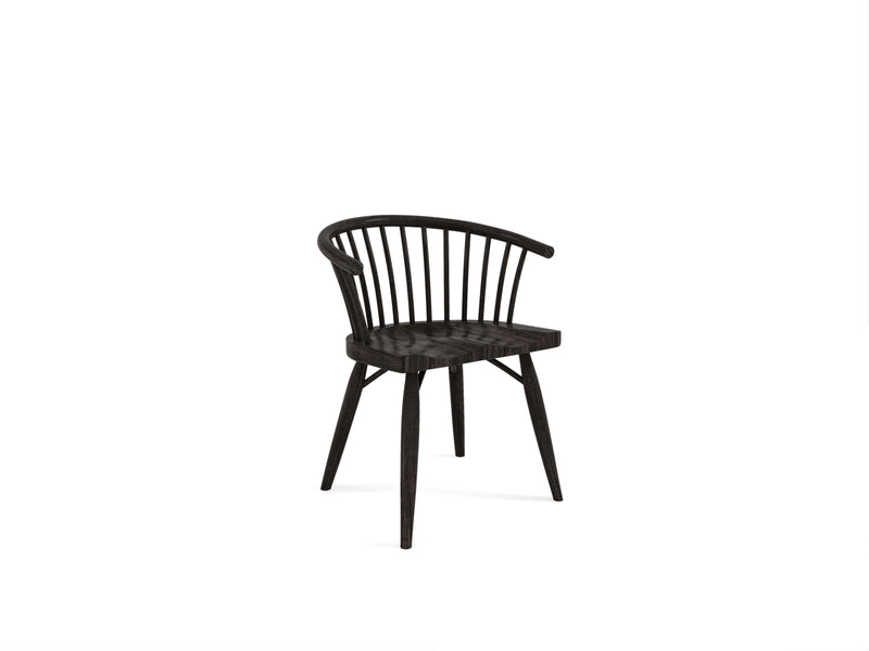 Introducing the Maria Dining Chair - Charred Ember by James+James: an elegantly minimalist wooden chair featuring a curved backrest with thin, evenly-spaced vertical slats. Supported by four tapered legs and finished in a dark, almost black stain, this chair boasts a flat seat and seamlessly blends modern design with classic appeal.