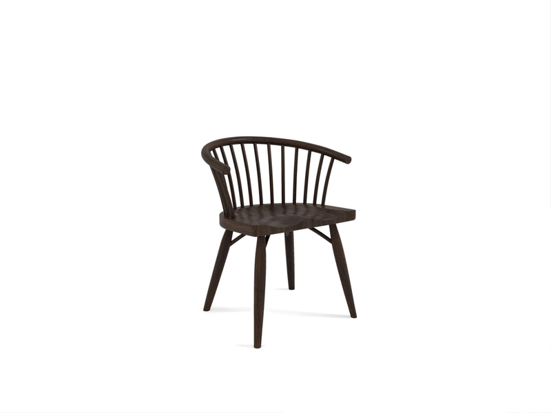 Introducing the Maria Dining Chair in Tobacco by James+James: a sophisticated wooden chair with a dark tobacco finish. It boasts a rounded backrest adorned with vertical slats, four elegantly tapered legs, and a gently curved seat. This design masterfully blends traditional and contemporary elements for a sleek, minimalist appearance.