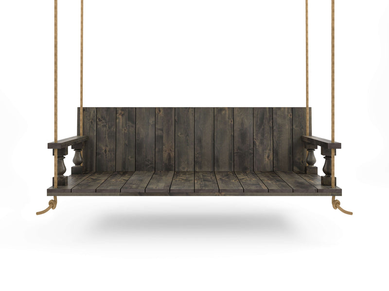 The Maisie Porch Swing - Deep Grey by James+James is suspended by two thick ropes on either side. The swing, featuring a deep grey finish and armrests on both ends, is shown against a plain white background.