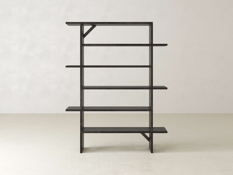 The Unique Shelf by James+James offers a minimalist wooden design with a light brown finish. This exceptional piece features an asymmetrical design with varying heights and lengths, creating an open and airy feel. It stands beautifully against a plain, light-colored wall and floor, adding personalized decor to your space.