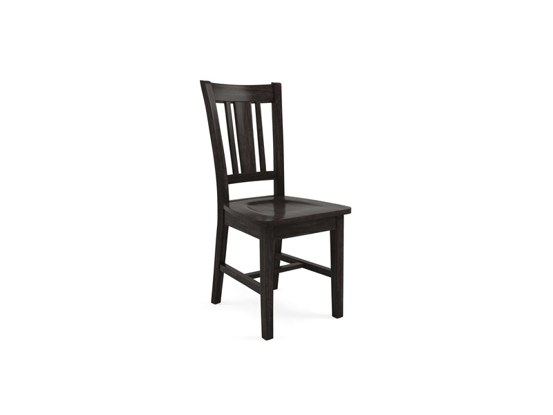 The William Dining Chair - Charred Ember by James+James features a slatted backrest and a slightly curved seat crafted from dark wood. It stands on four straight legs, reinforced with horizontal supports for added stability. The simple and classic design makes it suitable for various dining settings.