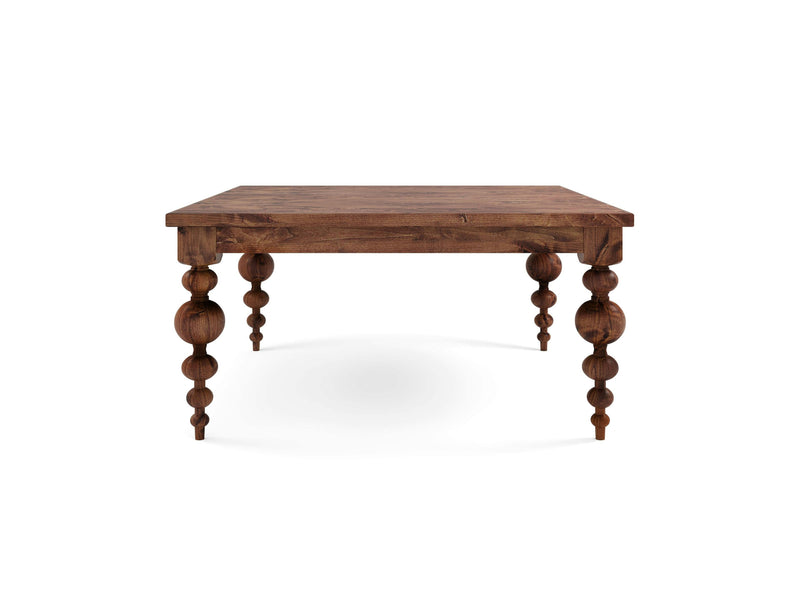 The Olivia Square Dining Table - Tuscany by James+James is a wooden table with a dark finish, showcasing intricately carved, bulbous legs. This simple and functional structure stands on four legs, emphasizing traditional craftsmanship against a plain white background.