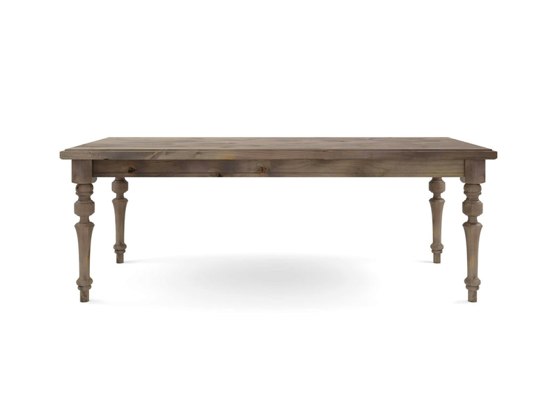 The Allyson Dining Table in Barn Wood by James+James is a rectangular wooden dining table with a natural finish. Featuring sturdy, turned legs with intricate detailing, this table boasts a simple yet elegant design, making it suitable for both traditional and modern interiors.