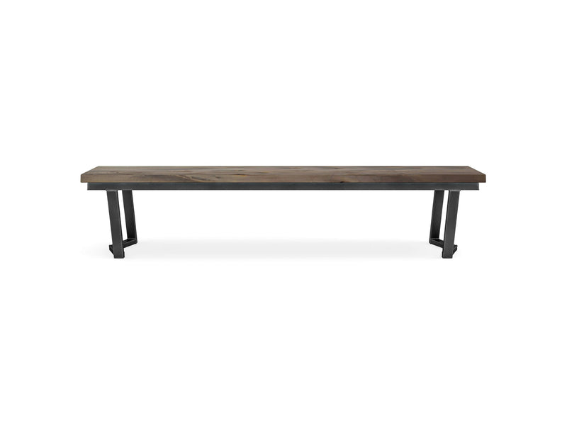 The Arkwright Bench - Barn Wood by James+James features a simple, minimalist design with a flat, rectangular seat made from dark-finished wood and sturdy black metal legs. The legs are positioned at each end to ensure stability, contributing to its modern and streamlined aesthetic.