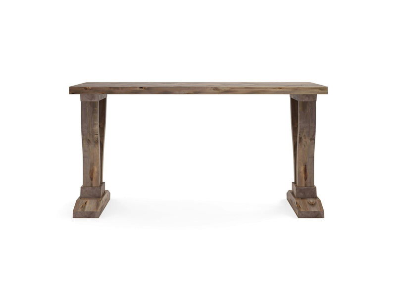 The Vera Sofa Table by James+James is a rustic, wooden console table with a minimalist design. The table features two sturdy, tapered legs positioned at either end, with a rectangular top showcasing natural wood grain and imperfections, adding to its charm. The base of each leg is wide for added stability.