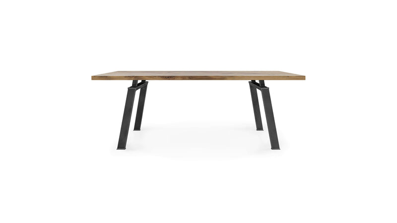 Introducing the Fulton Dining Table - Harvest Wheat by James+James: a contemporary rectangular wooden table featuring sleek black metal legs. Its clean and minimalist design highlights a light wooden top with a natural finish, while the slightly angled black metal legs add to its modern appeal.