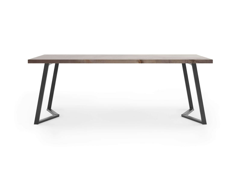 Introducing the Arkwright Desk - Barn Wood from James+James: a minimalist table featuring a rectangular wooden top paired with stylish angled metal legs. The black legs showcase a triangular design, giving the desk a modern and sleek look. Set against a white background, this desk stands out prominently in any space.