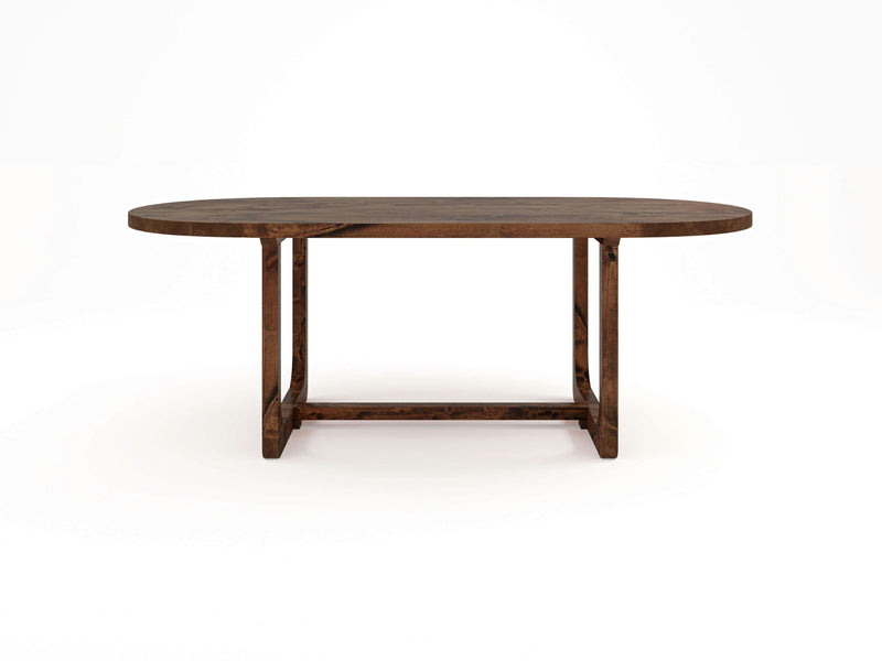 The Emersen Oval Dining Table - Tuscany by James+James is crafted from wood and showcases a rich brown finish. It boasts a sturdy base with crossed supports and smooth, rounded edges, blending contemporary design with classic elegance against a plain white background.