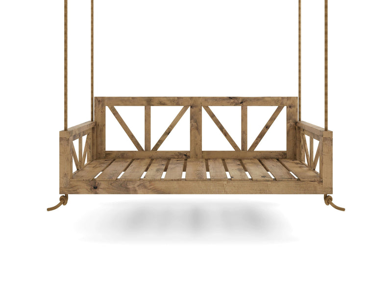 The Avery Porch Swing - Harvest Wheat by James+James features a slatted seat and backrest with a rustic design. The wooden swing is suspended by thick ropes on either side, casting a subtle shadow beneath it against a white background.