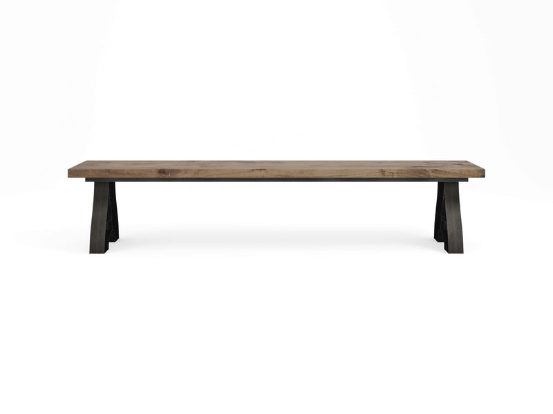 A sleek Wishbone Bench - Harvest Wheat by James+James, featuring a long, minimalist design with a rustic finish. The bench boasts a simple, flat seat and sturdy, angled legs, positioned against a plain white background.