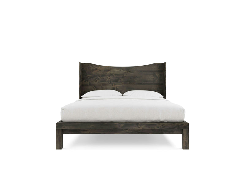 From the front, the Harlow Bed in Deep Grey by James+James is displayed with a curved headboard. The bed is neatly made with white bedding, including a comforter and two pillows. The background is plain white.