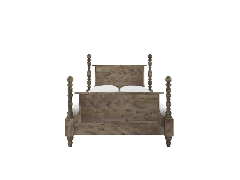 The Catherine Bed - Barn Wood by James+James boasts a rustic design with a high headboard and footboard. It features four decorative, turned posts at each corner and is crafted from medium-toned wood. Two white pillows adorn the bed.