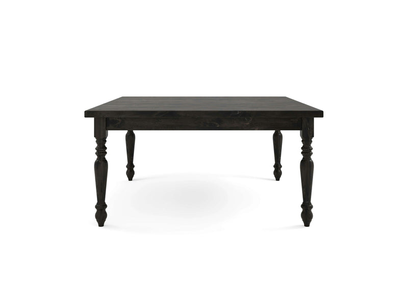 Introducing the French Country Square Dining Table - Charred Ember by James+James. This table features a dark, square wooden top and four intricately carved legs, showcasing a simple yet elegant design that highlights the detailed craftsmanship. Set against a white background, the dark color and exquisite details of this table are truly accentuated.