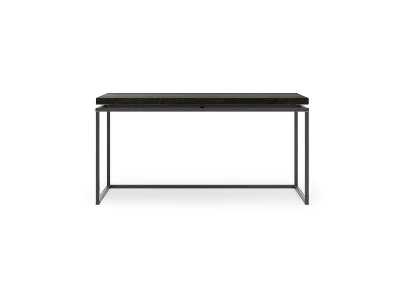 The Floating Top Sofa Table - Charred Ember by James+James is a minimalist modern desk featuring a dark rectangular tabletop supported by a thin metal frame. Its design is simple and sleek, with clean lines and no additional features or storage components. The desk appears to float due to its open-frame legs.