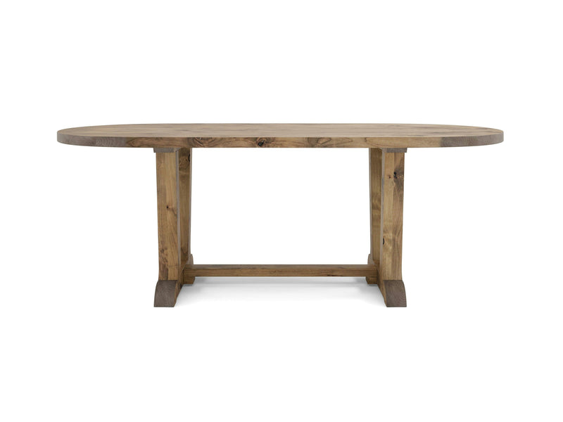 The Thaden Oval Dining Table - Harvest Wheat by James+James features a solid, sturdy design with a thick tabletop and robust legs connected by a horizontal support beam. This wooden, oval-shaped dining table boasts a rustic finish, exuding a natural, classic look suitable for various dining settings.