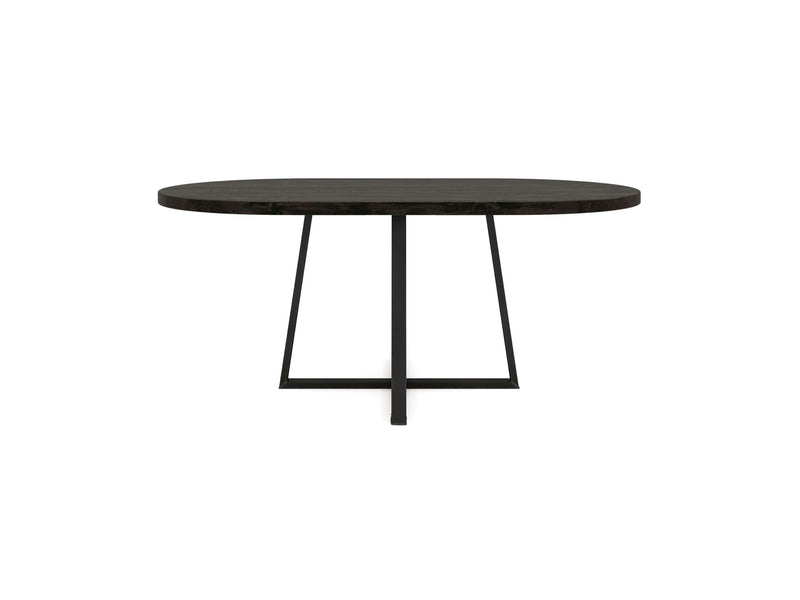 The Watson Oval Dining Table - Charred Ember by James+James features a sleek, minimalist design with a smooth and polished dark-colored wooden top. Its modern aesthetic is enhanced by a central support with two angled black metal legs, creating a contemporary look.